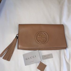 Classic nude authentic Gucci clutch